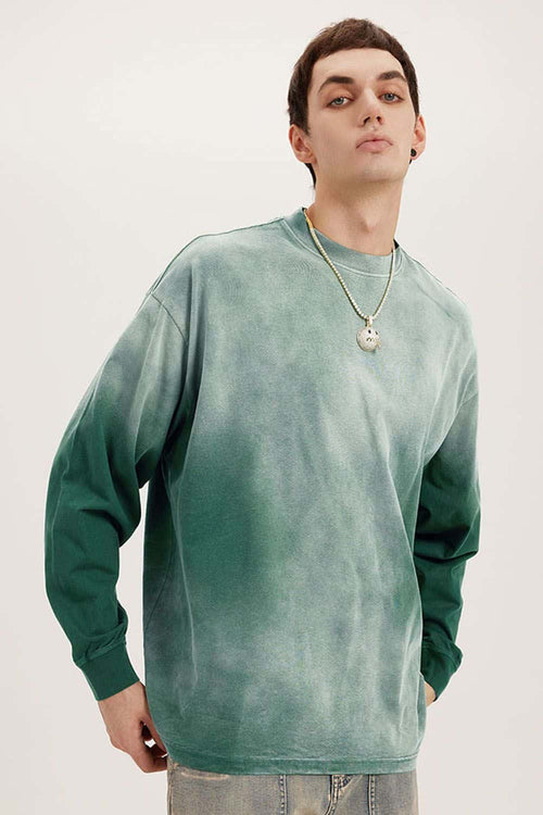 Washed Drop-Shoulder Long-Sleeve Cotton T-Shirt in Green - front modeled close-up