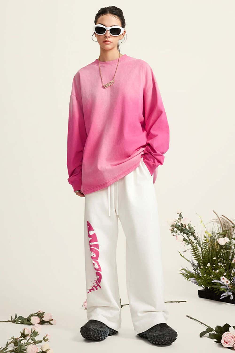 Washed Drop-Shoulder Long-Sleeve Cotton T-Shirt in Rose Red - full-length front modeled view