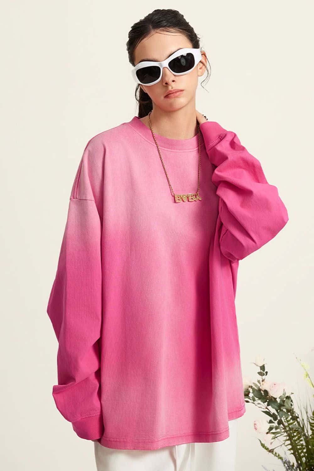 Washed Drop-Shoulder Long-Sleeve Cotton T-Shirt in Rose Red - front modeled close-up