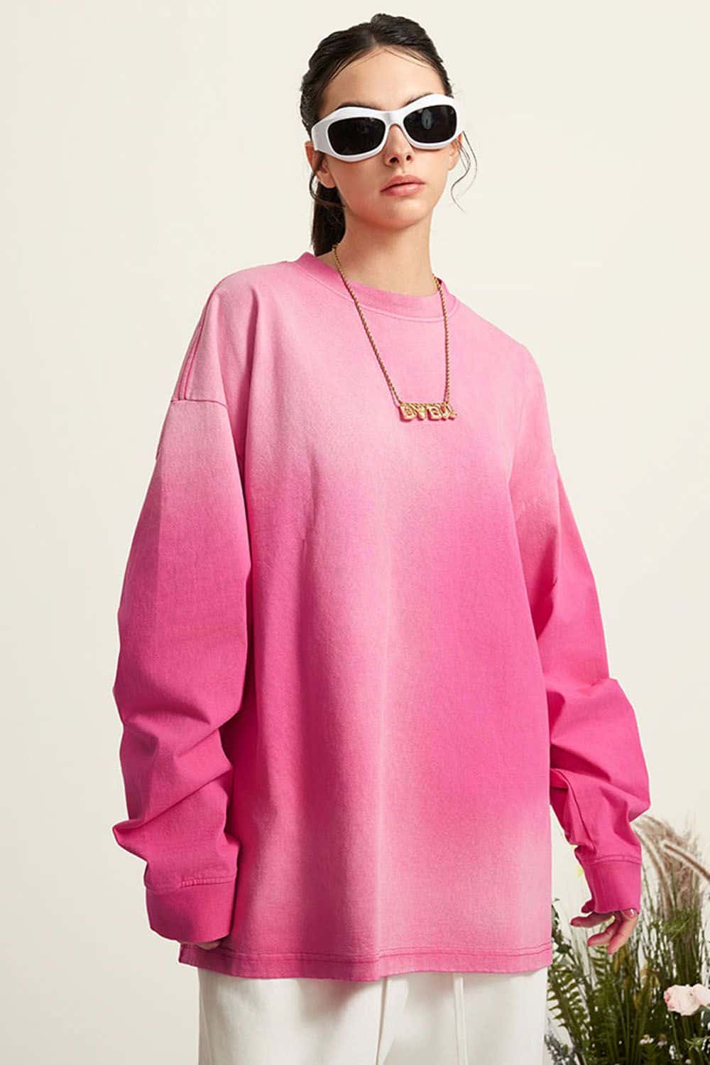 Washed Drop-Shoulder Long-Sleeve Cotton T-Shirt in Rose Red - front modeled close-up