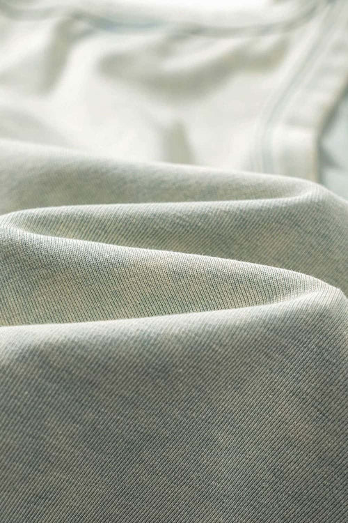 Ruched Asymmetric-Hem Fitted Cotton-Blend Sleeveless Top in Haze Blue - fabric texture close-up