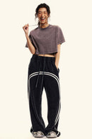 Cool-Touch Quick-Drying Sorona Blend Cropped T-Shirt in Raspberry Purple - front modeled view