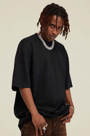 Heavyweight Vintage-Wash Cotton Relaxed-Fit T-Shirt in Black - full-length front modeled view