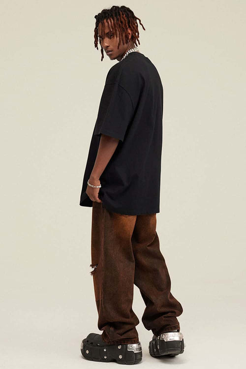 Heavyweight Vintage-Wash Cotton Relaxed-Fit T-Shirt in Black - three-quarter front modeled view