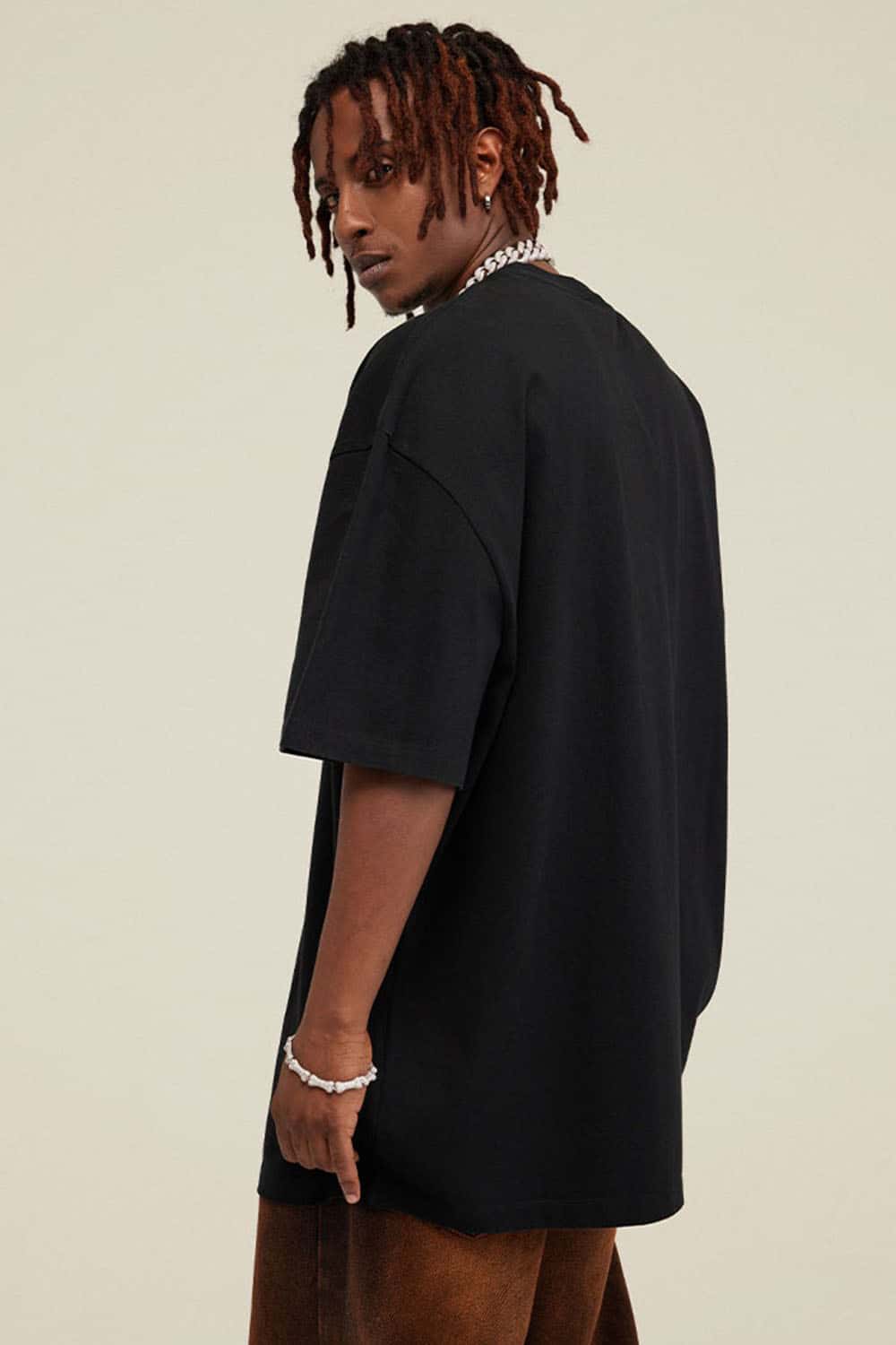 Heavyweight Vintage-Wash Cotton Relaxed-Fit T-Shirt in Black - back modeled view