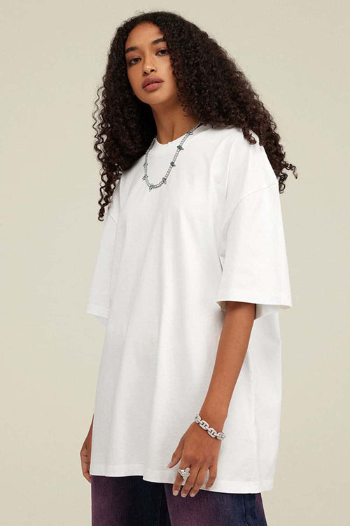Heavyweight Vintage-Wash Cotton Relaxed-Fit T-Shirt in Ivory White - full-length front modeled view