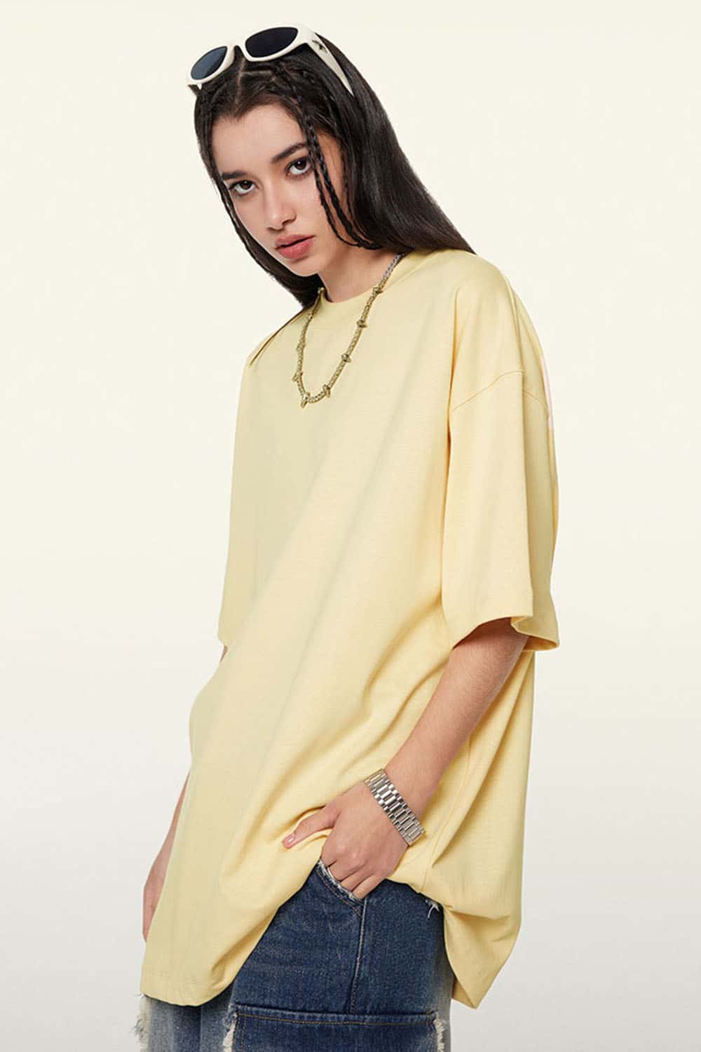 Ultra-Heavyweight Drop-Shoulder T-Shirt in Cream Apricot - three-quarter front modeled view