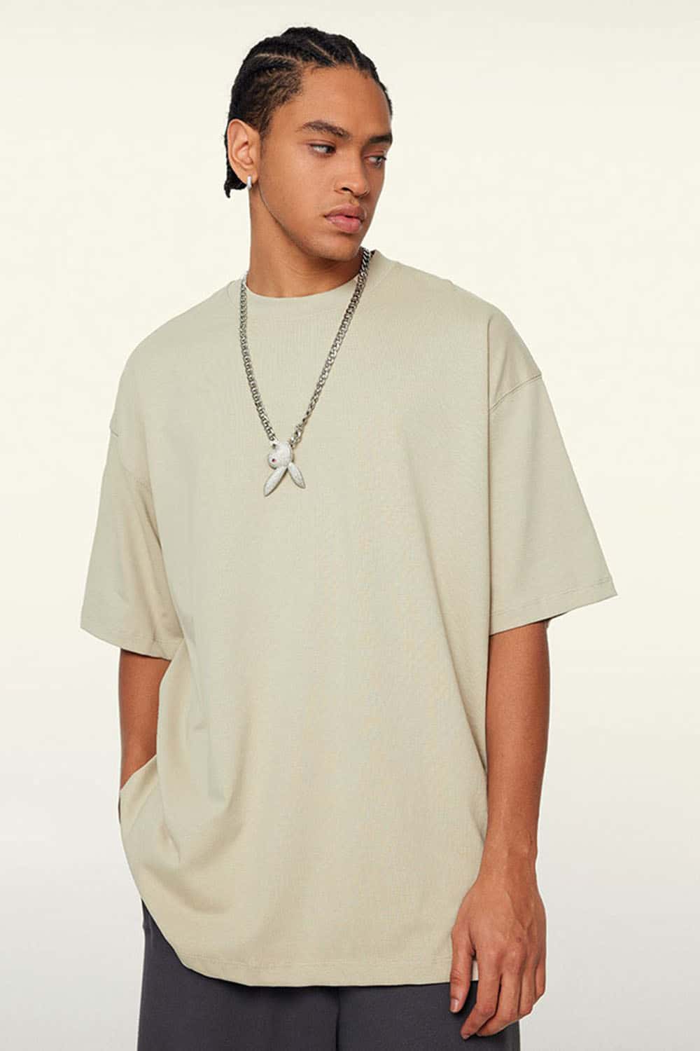 Ultra-Heavyweight Drop-Shoulder T-Shirt in Gray Apricot - three-quarter front modeled view