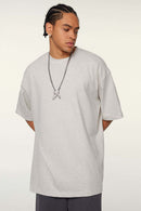 Ultra-Heavyweight Drop-Shoulder T-Shirt in Oat Gray - three-quarter front modeled view