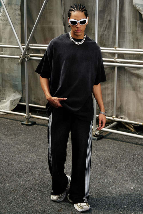 Heavyweight Washed Drop-Shoulder Cotton T-Shirt in Black - full-length front modeled view
