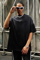 Heavyweight Washed Drop-Shoulder Cotton T-Shirt in Black - front modeled view