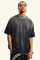 Heavyweight Washed Drop-Shoulder Cotton T-Shirt in Dirty Gray - front modeled view