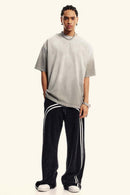 Heavyweight Washed Drop-Shoulder Cotton T-Shirt in Light Gray - full-length front modeled view