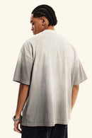 Heavyweight Washed Drop-Shoulder Cotton T-Shirt in Light Gray - side modeled view