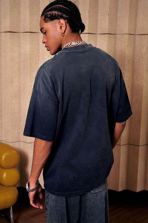 Heavyweight Washed Drop-Shoulder Cotton T-Shirt in Navy Blue - side modeled view