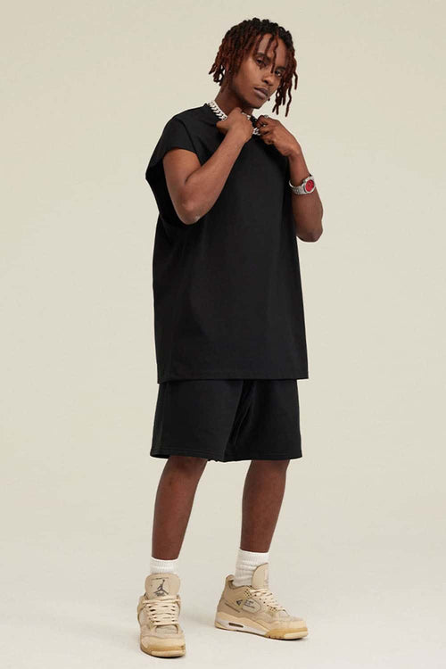 Heavyweight Relaxed Wide-Shoulder Cotton Sleeveless Top in Black - full-length front modeled view