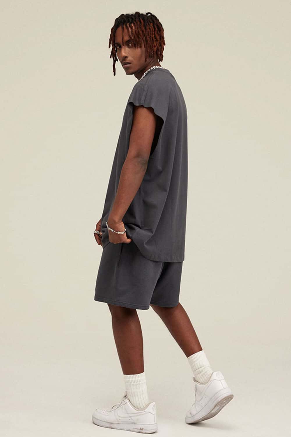 Heavyweight Relaxed Wide-Shoulder Cotton Sleeveless Top in Charcoal - three-quarter front modeled view