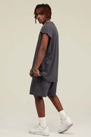 Heavyweight Relaxed Wide-Shoulder Cotton Sleeveless Top in Charcoal - three-quarter front modeled view