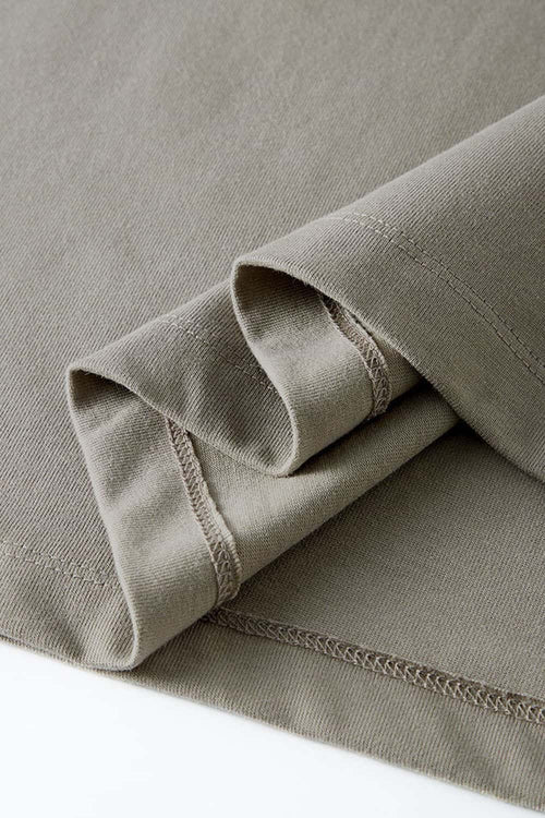 Heavyweight Relaxed Wide-Shoulder Cotton Sleeveless Top in Grayish Green - hem detail