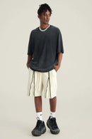 Washed Gradient Cotton Relaxed Drop-Shoulder T-Shirt in Black - full-length front modeled view
