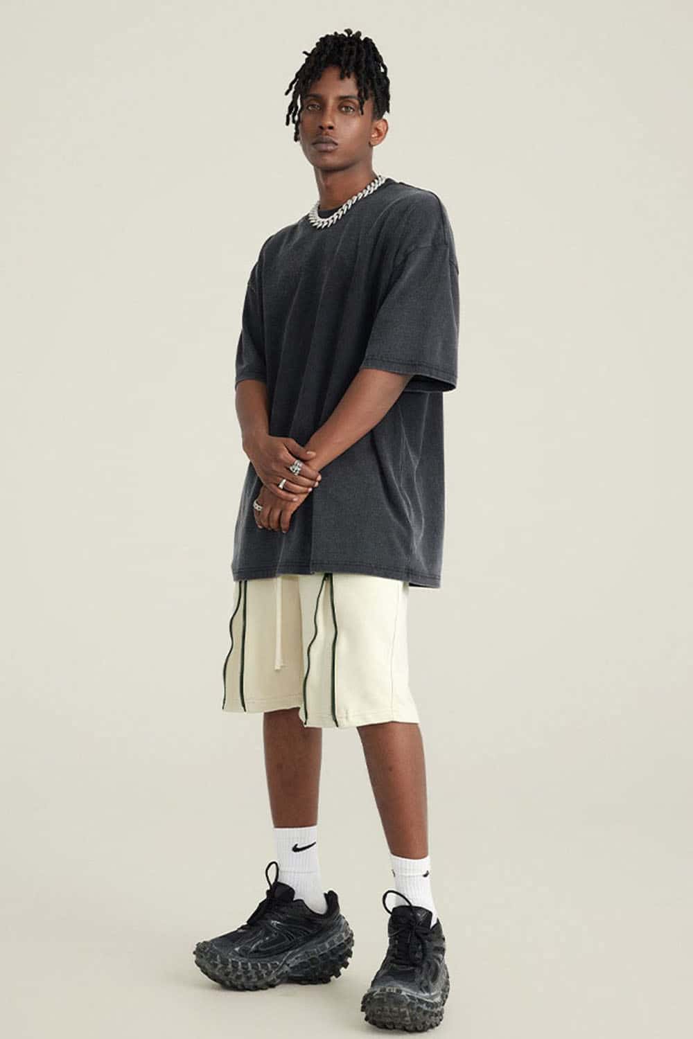 Washed Gradient Cotton Relaxed Drop-Shoulder T-Shirt in Black - full-length front modeled view