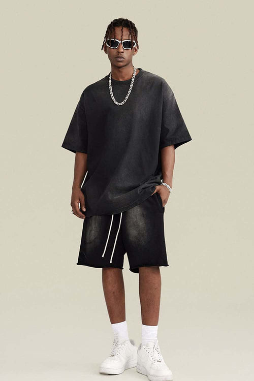 Washed Gradient Cotton Relaxed Drop-Shoulder T-Shirt in Black - full-length front modeled view
