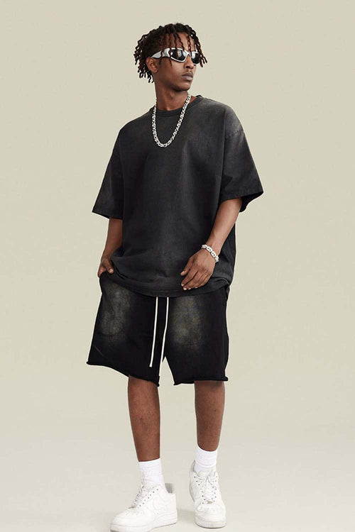 Washed Gradient Cotton Relaxed Drop-Shoulder T-Shirt in Black - full-length front modeled view