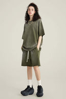 Washed Gradient Cotton Relaxed Drop-Shoulder T-Shirt in Military Green - full-length front modeled view