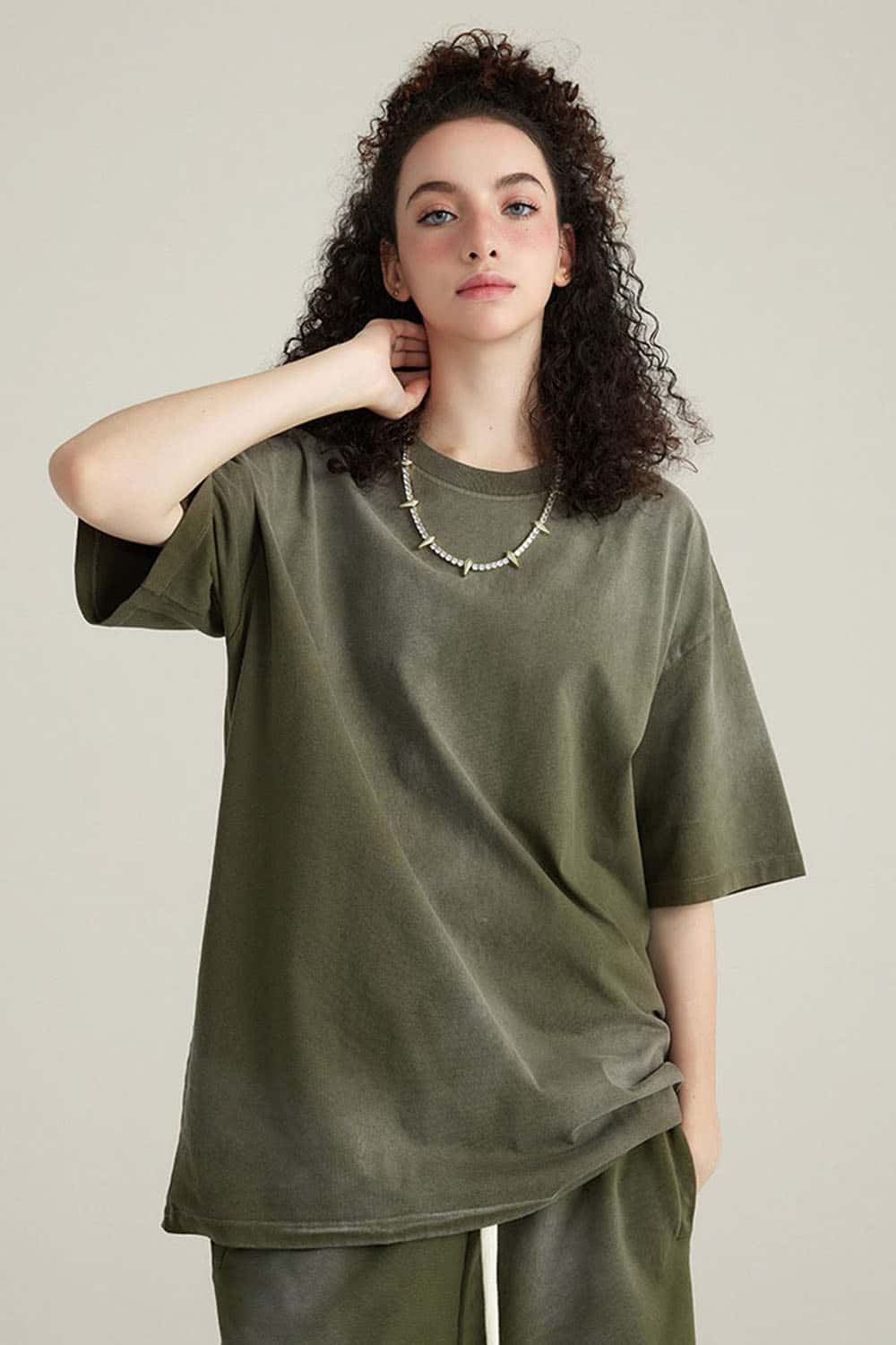 Washed Gradient Cotton Relaxed Drop-Shoulder T-Shirt in Military Green - front modeled view