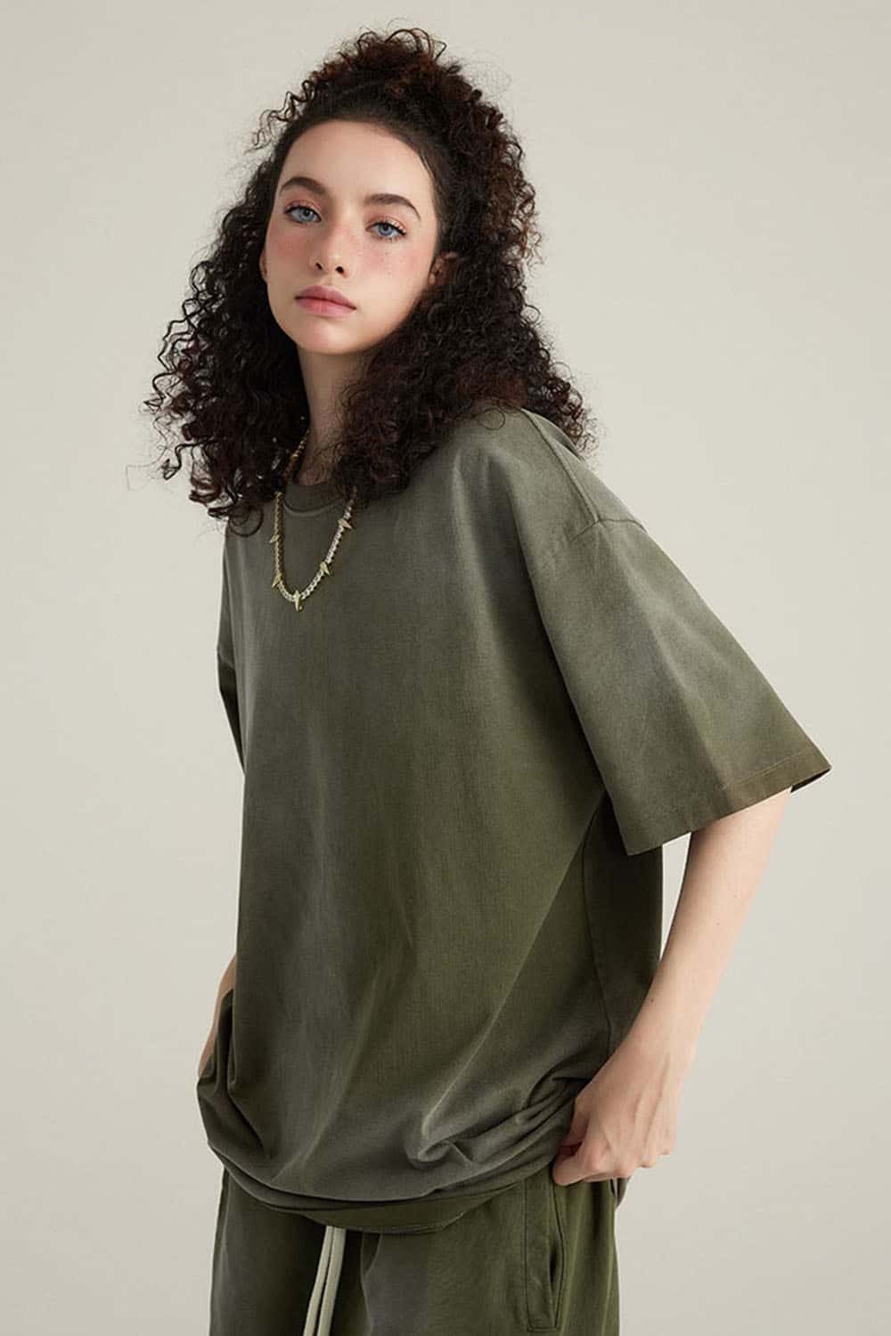 Washed Gradient Cotton Relaxed Drop-Shoulder T-Shirt in Military Green - front modeled view