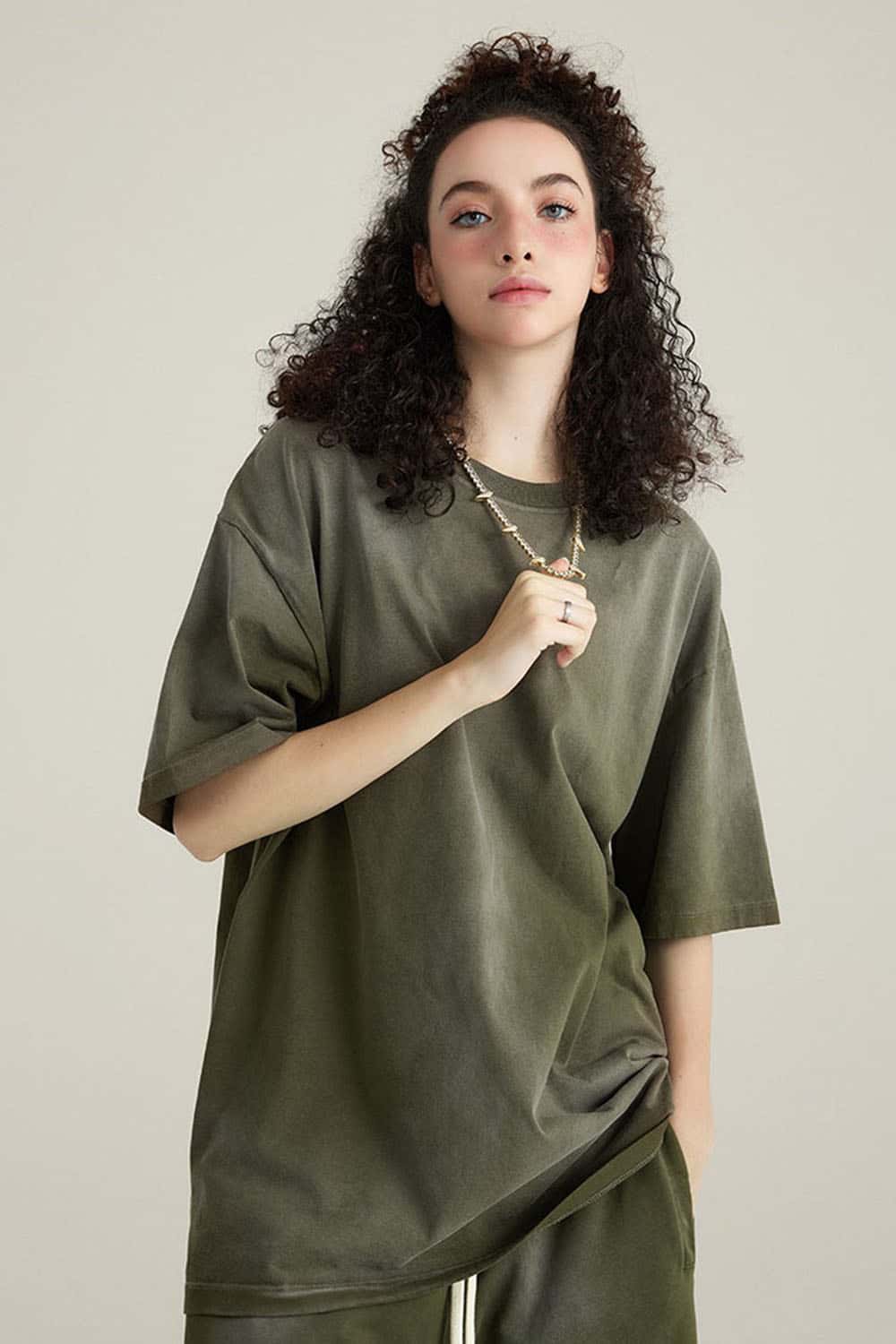 Washed Gradient Cotton Relaxed Drop-Shoulder T-Shirt in Military Green - front modeled view