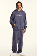 Heavyweight Washed Cotton Graphic Pullover Hoodie in Grape Purple - full-length front modeled view