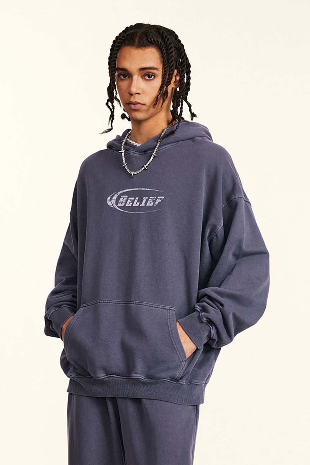 Heavyweight Washed Cotton Graphic Pullover Hoodie in Grape Purple - three-quarter front modeled view