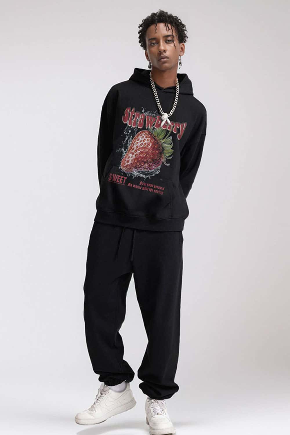 Heavyweight Strawberry-Graphic Cotton-Blend Hoodie in Black - full-length front modeled view