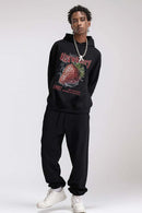 Heavyweight Strawberry-Graphic Cotton-Blend Hoodie in Black - full-length front modeled view