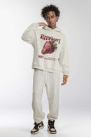 Heavyweight Strawberry-Graphic Cotton-Blend Hoodie in Oat Gray - full-length front modeled view