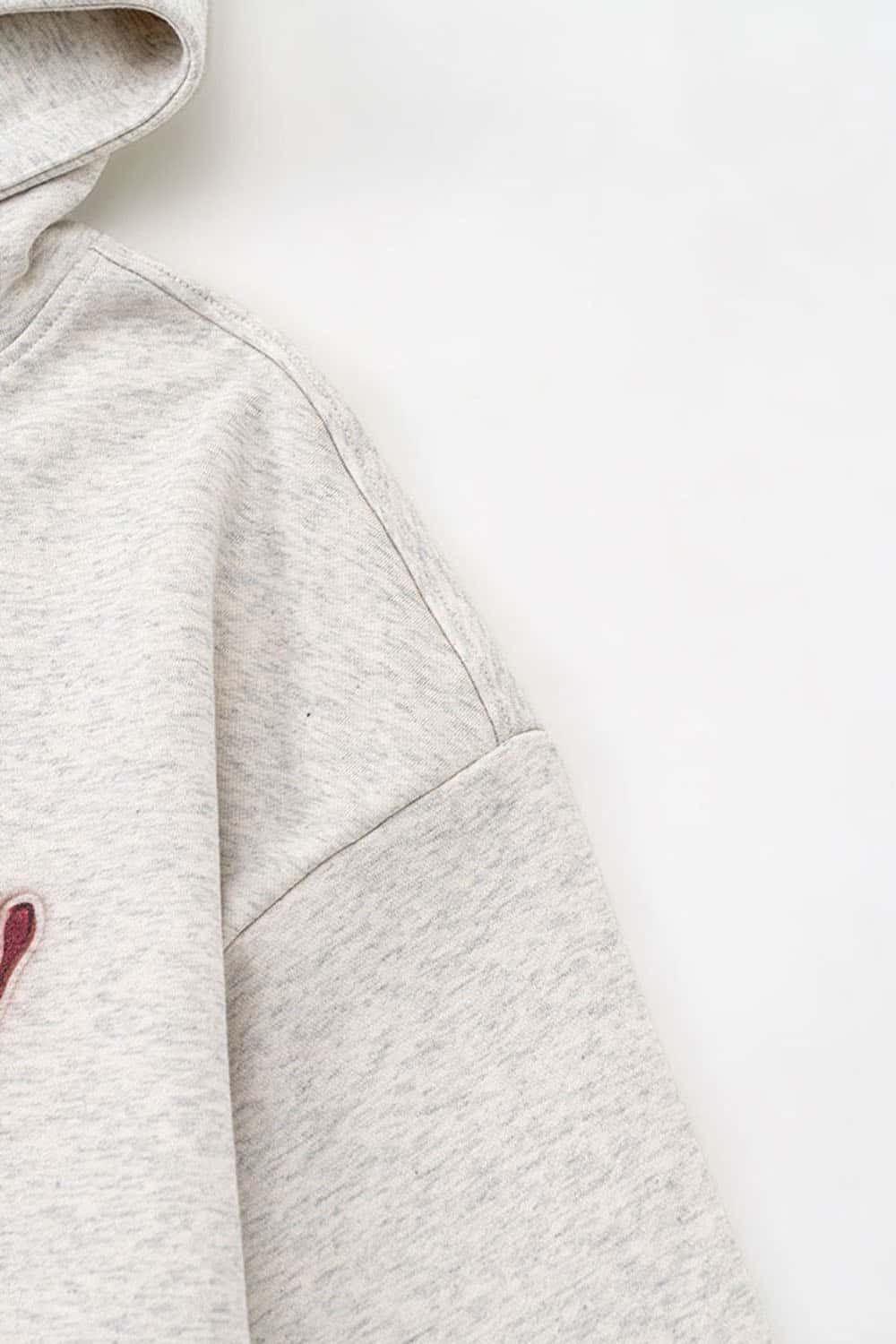 Heavyweight Strawberry-Graphic Cotton-Blend Hoodie in Oat Gray - product detail close-up