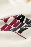Heavyweight Puff-Print Letter Graphic Pullover Hoodie in Milk Tea White - front modeled close-up