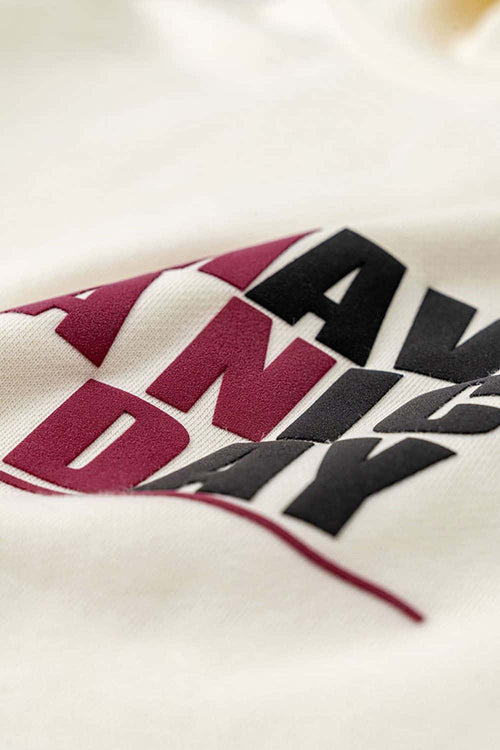 Heavyweight Puff-Print Letter Graphic Pullover Hoodie in Milk Tea White - front modeled close-up
