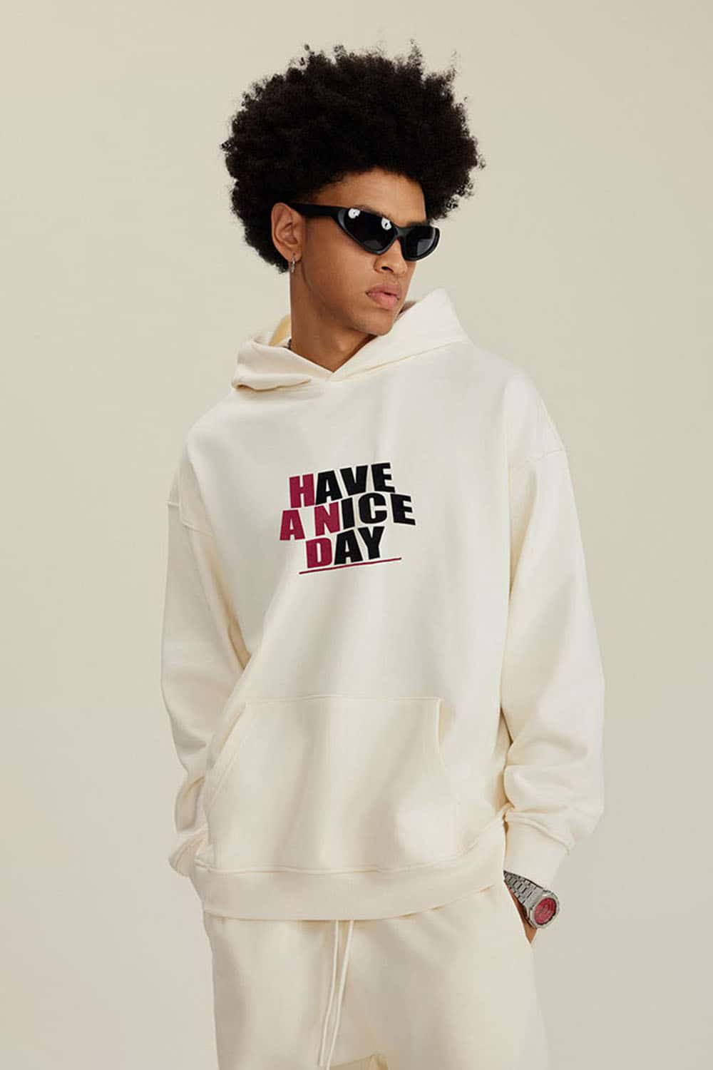 Heavyweight Puff-Print Letter Graphic Pullover Hoodie in Milk Tea White - three-quarter front modeled view