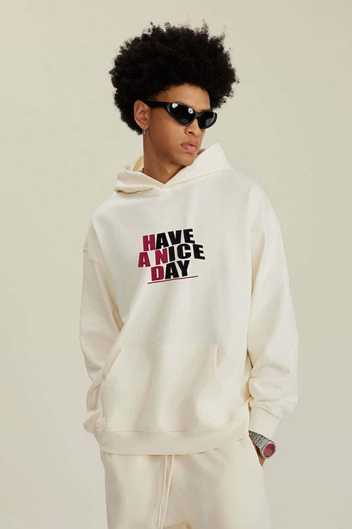 Heavyweight Puff-Print Letter Graphic Pullover Hoodie in Milk Tea White - three-quarter front modeled view