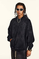 Washed Paint-Splatter Pullover Hoodie in Black - front modeled view