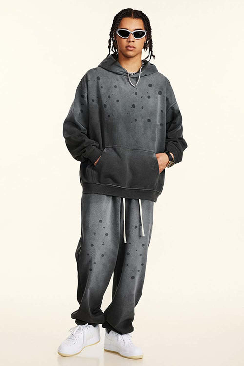 Washed Paint-Splatter Pullover Hoodie in Dark Gray - full-length front modeled view