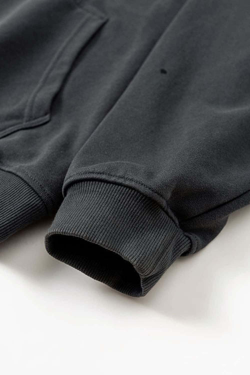 Washed Paint-Splatter Pullover Hoodie in Dark Gray - modeled view
