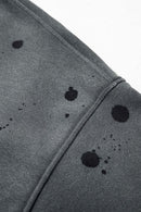 Washed Paint-Splatter Pullover Hoodie in Dark Gray - modeled view