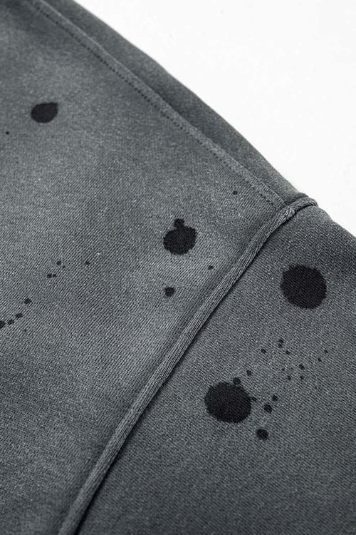 Washed Paint-Splatter Pullover Hoodie in Dark Gray - modeled view