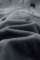 Washed Paint-Splatter Pullover Hoodie in Dark Gray - modeled view