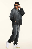 Washed Paint-Splatter Pullover Hoodie in Dark Gray - front modeled view