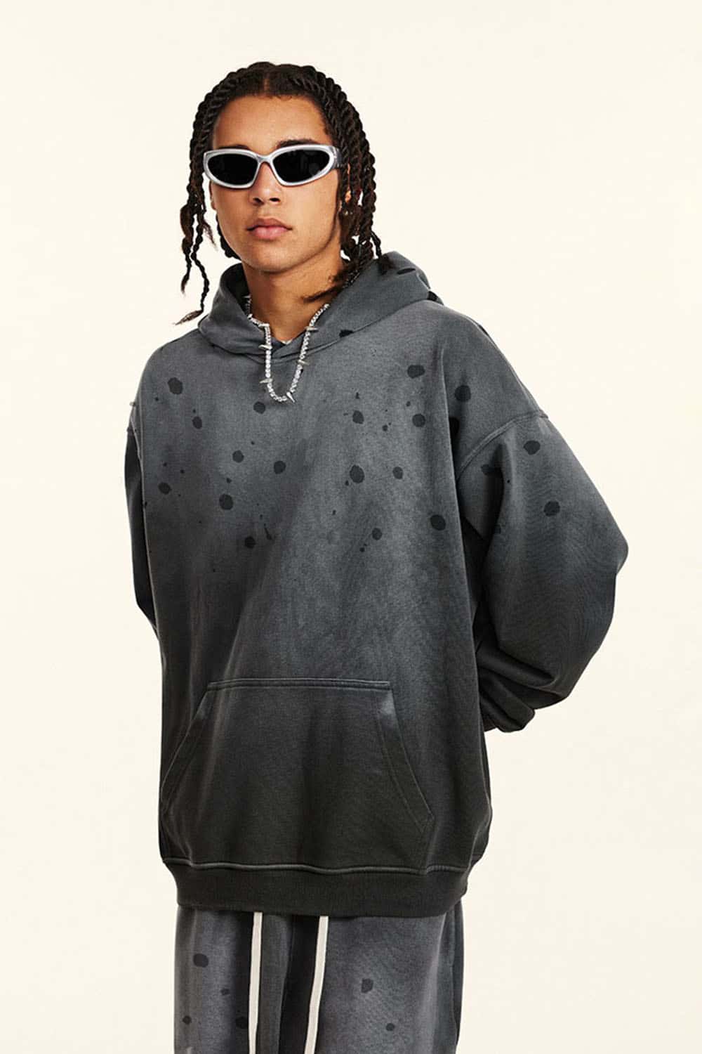 Washed Paint-Splatter Pullover Hoodie in Dark Gray - front modeled view