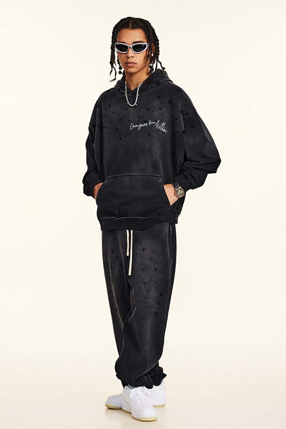 Distressed Gradient-Wash Splatter-Graphic Pullover Hoodie in Black - full-length front modeled view